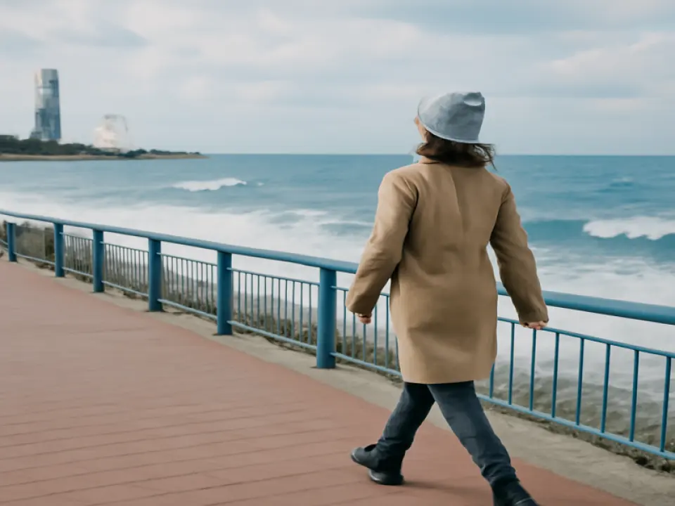 Walk the seafront on a windy day